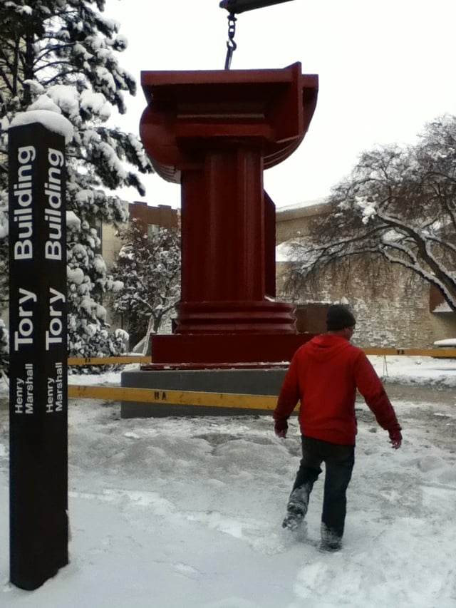 British artist and U of A alumni Andrew French installs his 1999 sculpture, "Pillar," on the University of Alberta campus, November 2012.