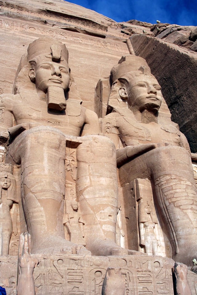 Four colossal statues of Ramesses II flank the entrance of his temple Abu Simbel