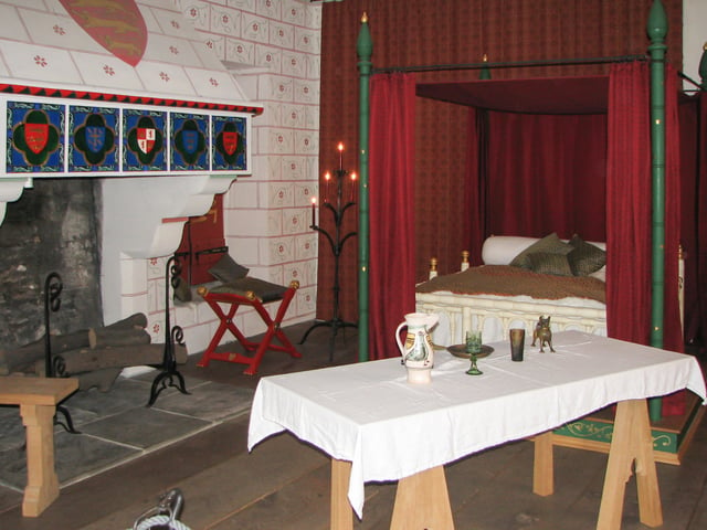 Reconstruction of Edward I's private chambers at the Tower of London with the pattern stones and roses on the wall