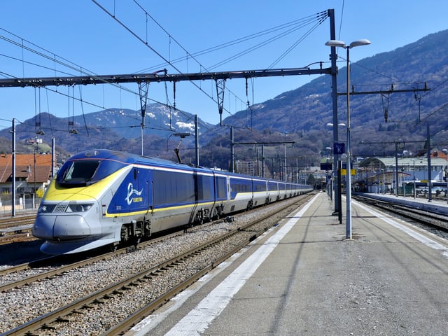Eurostar at Gare d'Albertville. These long trains connect London with Paris and Brussels, are narrower to fit the British loading gauge (this was required when running services to and from London Waterloo), and have extensive fireproofing in case of fire in the Channel Tunnel.