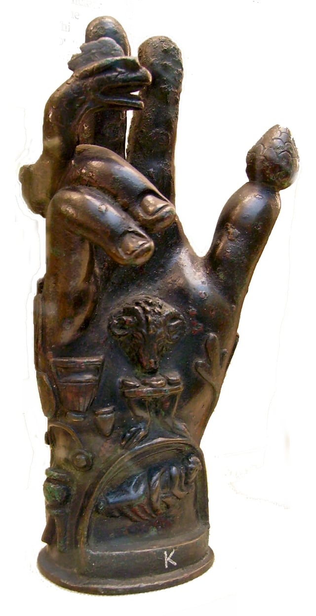 Bronze hand used in the worship of Sabazios (British Museum). Roman 1st–2nd century CE. Hands decorated with religious symbols were designed to stand in sanctuaries or, like this one, were attached to poles for processional use.