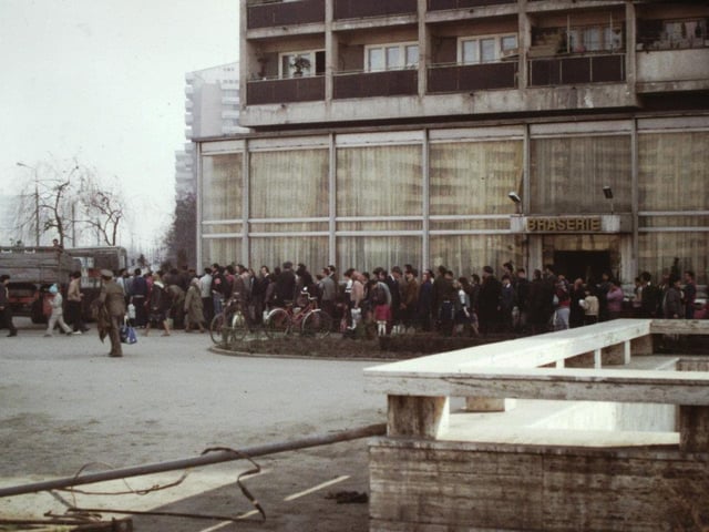 A line for the distribution of cooking oil in Bucharest, Romania in May 1986