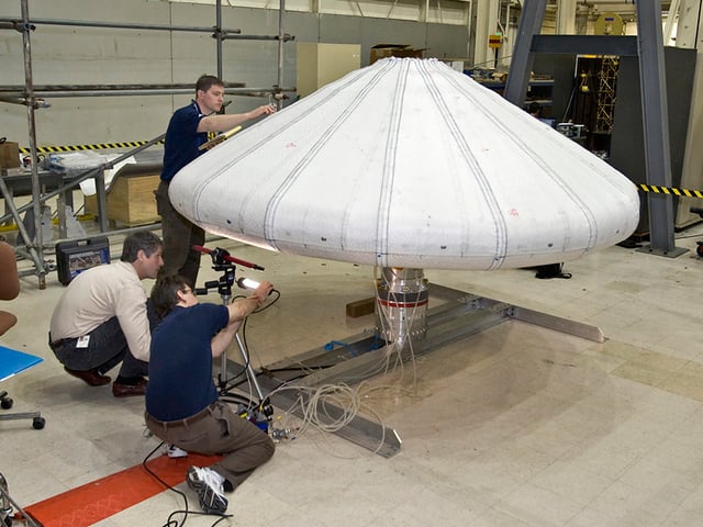 NASA engineers check IRVE.