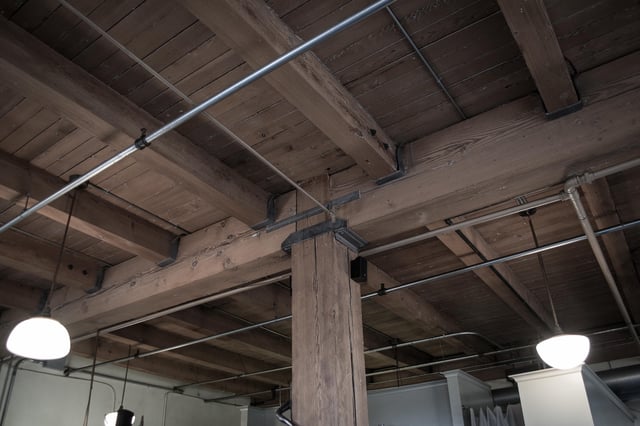 A double floor is a floor framed with joists supported by larger timbers.