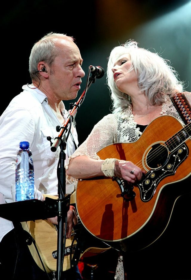 Harris performing with Mark Knopfler, in the Netherlands