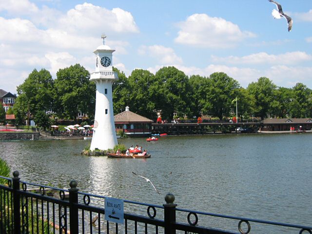 The lake at Roath Park, including the lighthouse erected as a memorial to Captain Scott