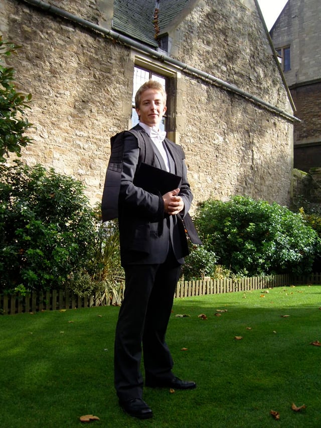 An undergraduate student at the University of Oxford in subfusc for matriculation