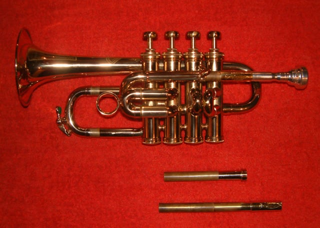 Piccolo trumpet in B♭, with swappable leadpipes to tune the instrument to B♭ (shorter) or A (longer)