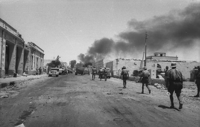 Afrika Korps infantrymen enter Tobruk after the Allied collapse in June 1942