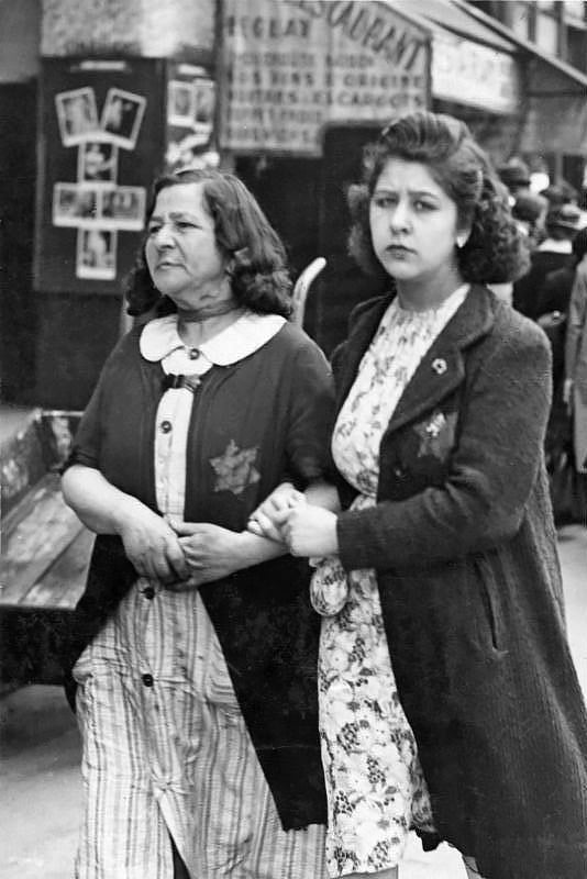 Jewish women wearing yellow badges in occupied Paris, June 1942