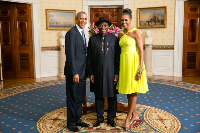 Former Nigerian President Goodluck Jonathan (center) poses with United States President Barack Obama and First Lady Michelle Obama in August 2014