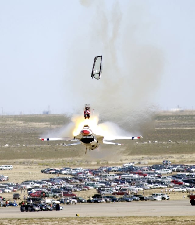 A U.S. Air Force Thunderbirds pilot ejects from the F-16 just before impact at an air show in September 2003.
