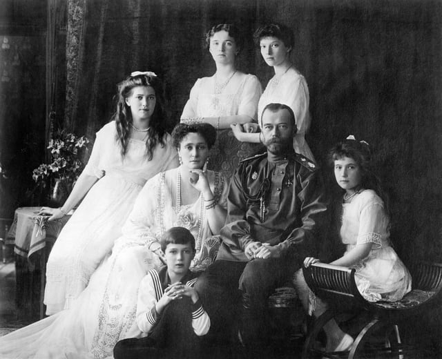 The Russian Imperial Family, 1913. Left to right: Grand Duchess Maria, Tsarina Alexandra, Grand Duchesses Olga and Tatiana, Tsar Nicholas II, and Grand Duchess Anastasia. Tsarevich Alexei sits in front of his parents.