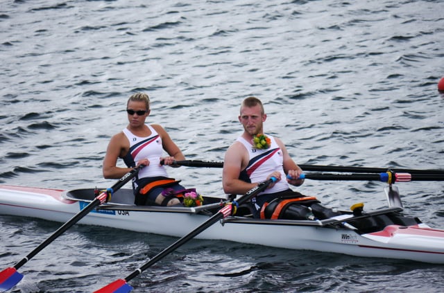 Oksana Masters & Rob Jones of the US in the mixed sculls (TA 2x) final at the Paralympics, London 2012. The rowers are fixed to the seat.
