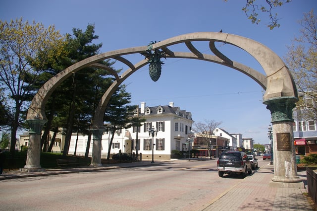 The gateway arch over Atwells Avenue is a Federal Hill landmark. A sculpture of a pignoli cluster hangs from the center.