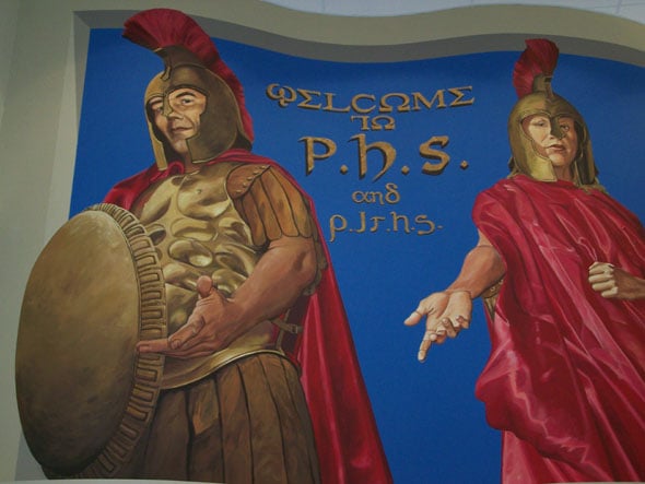 Mural in the new high school of the school mascot Trojans. Artist Herb Roe