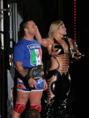 Phoenix (right) and Santino Marella in November 2008 as the Women's and Intercontinental champions, respectively