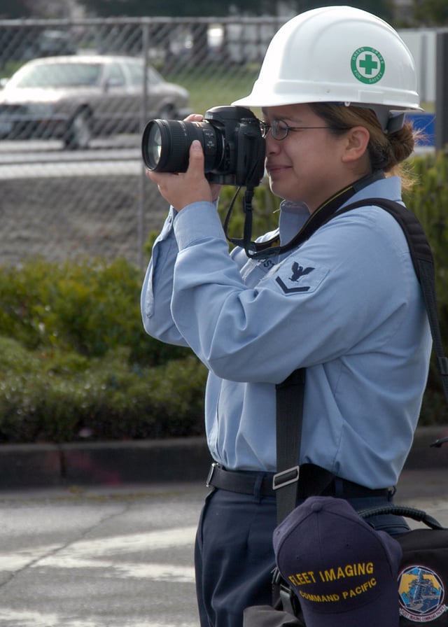 A U.S. Navy photographer in March 2004.