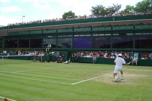 Sébastien Grosjean takes a shot on Court 18 during the 2004 Championships.