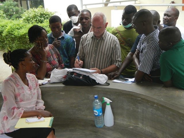 MSF logistician in Nigeria showing plans