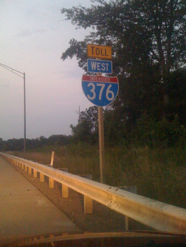 An I-376 trailblazer with the new black-on-yellow "Toll" sign