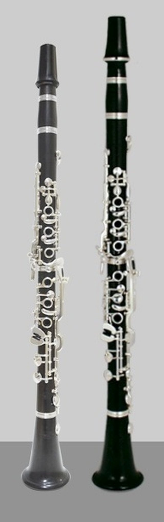 Oehler system clarinets use additional tone holes to correct intonation (patent C♯, low E-F correction, fork-F/B♭ correction and fork B♭ correction)