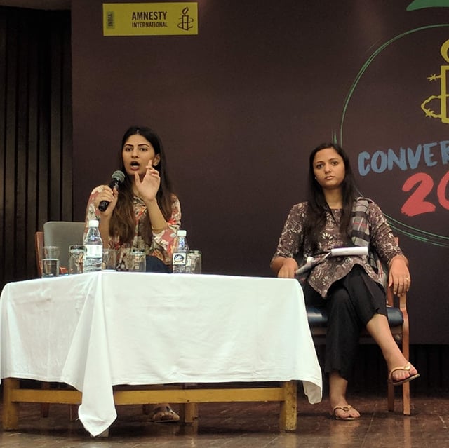 Gurmehar Kaur (left) at an Amnesty International event, Conversations 18', in New Delhi. Shehla Rashid (right) also pictured.