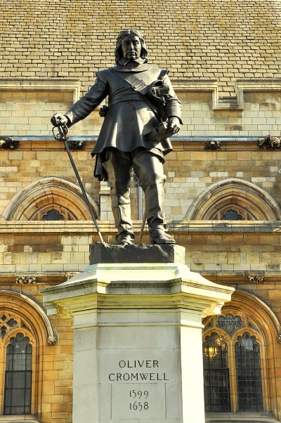 1899 statue of Oliver Cromwell, Westminster by Hamo Thornycroft outside the Palace of Westminster, London