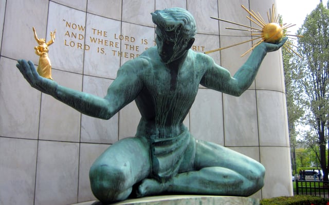 The Coleman A. Young Municipal Center houses the City of Detroit offices; shown here is The Spirit of Detroit statue