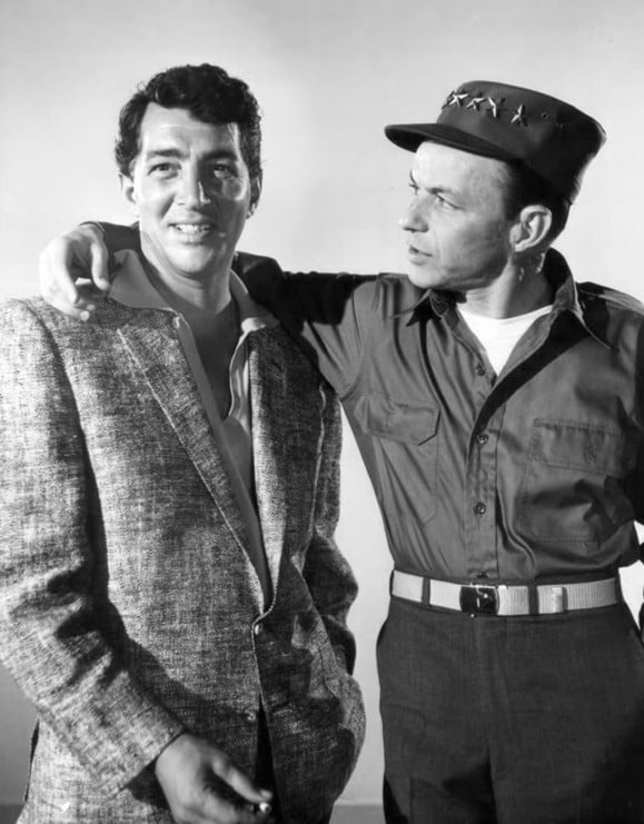 Dean Martin and Frank Sinatra appear in a number of Warner Bros. films produced in the early 1960s. Both singers also recorded for Reprise Records, which the studio purchased in 1963.