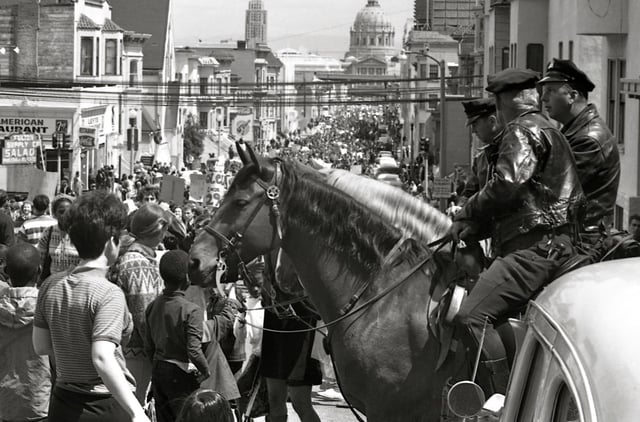 Mounted policeman observe a protest march against the Vietnam War in San Francisco in 1967.