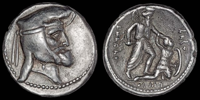 Drachm of the Frataraka ruler Vahbarz (Oborzos), thought to have initiated the independence of Persis from the Seleucid Empire. The coin shows on the reverse an Achaemenid king slaying an armoured, possibly Greek or Macedonian, soldier.  This possibly refers to the events related by Polyainos (Strat. 7.40), in which Vahbarz (Oborzos) is said to have killed 3000 Seleucid settlers.