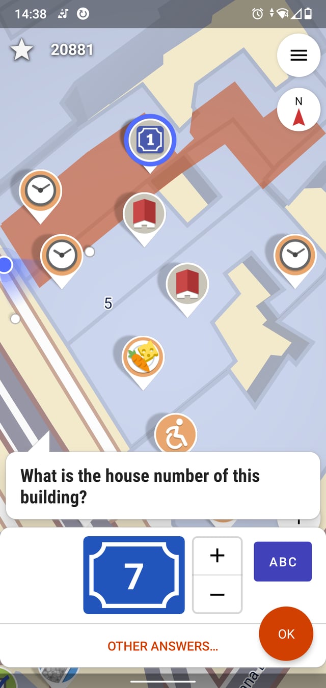StreetComplete asking user a question, with answer filled in. After tapping "OK" this answer will be added to an OpenStreetMap database.