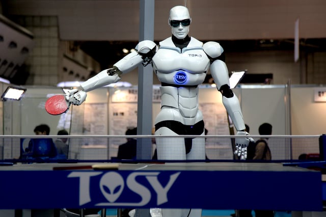 A Vietnamese-made TOPIO 3.0 humanoid ping-pong-playing robot displayed during the 2009 International Robot Exhibition (IREX) in Tokyo.