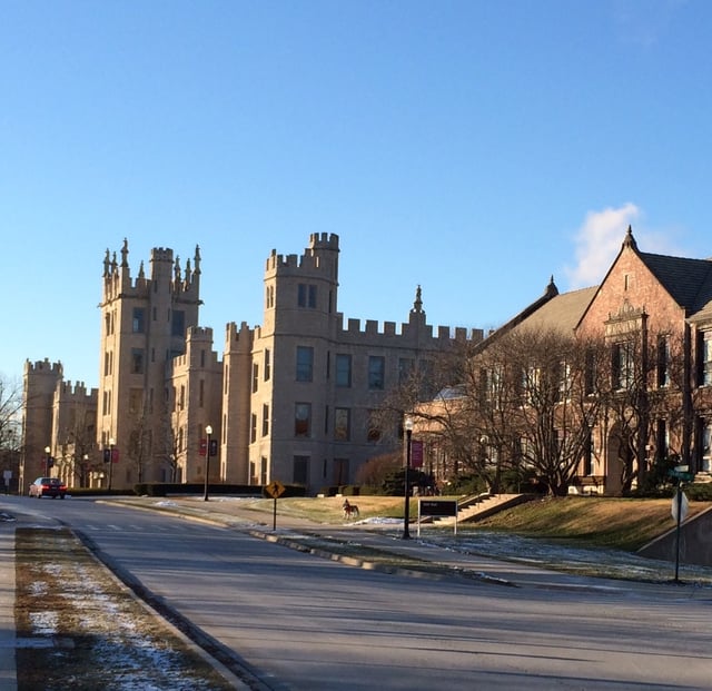 Altgeld Hall and Still Hall along College Avenue. Altgeld Hall was the first building to be constructed on campus.