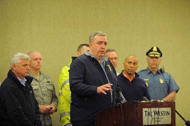 Boston Police Commissioner Edward F. Davis gives a news conference about the bombing on April 15. Governor Deval Patrick is second from right and Suffolk District Attorney Daniel F. Conley is at far left.