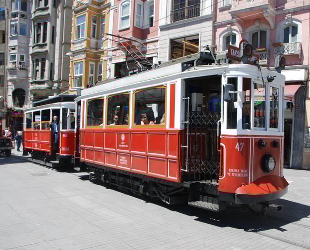 A historic red tram on İstiklal Avenue