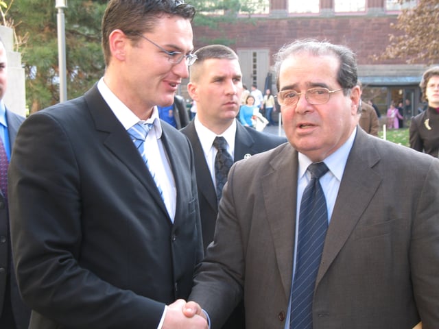 Scalia (right) at the Harvard Law School on November 30, 2006