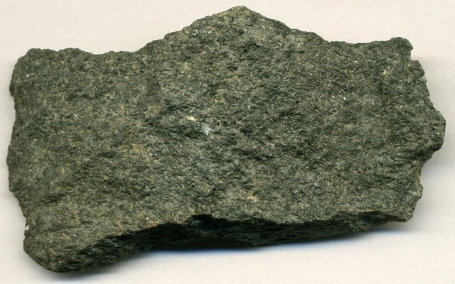 Metamorphosed basalt from an Archean greenstone belt in Michigan, US. The minerals that gave the original basalt its black colour have been metamorphosed into green minerals.