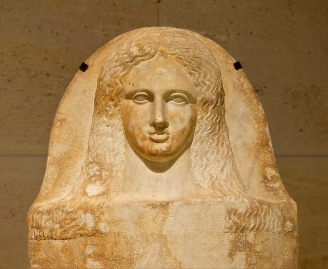 Cover of a Phoenician anthropoid sarcophagus of a woman, made of marble, 350–325 BC, from Sidon, now in the Louvre.