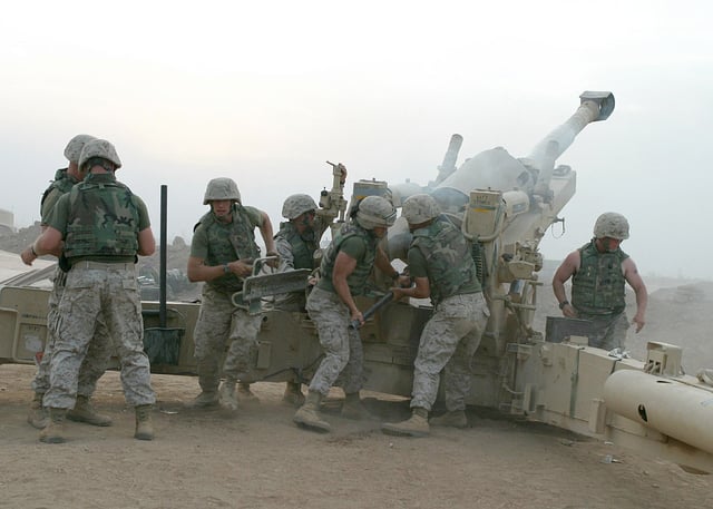 A USMC M198 artillery piece firing outside Fallujah in October 2004