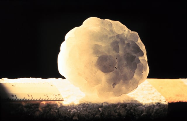 A large hailstone, about 6 cm (2.4 in) in diameter