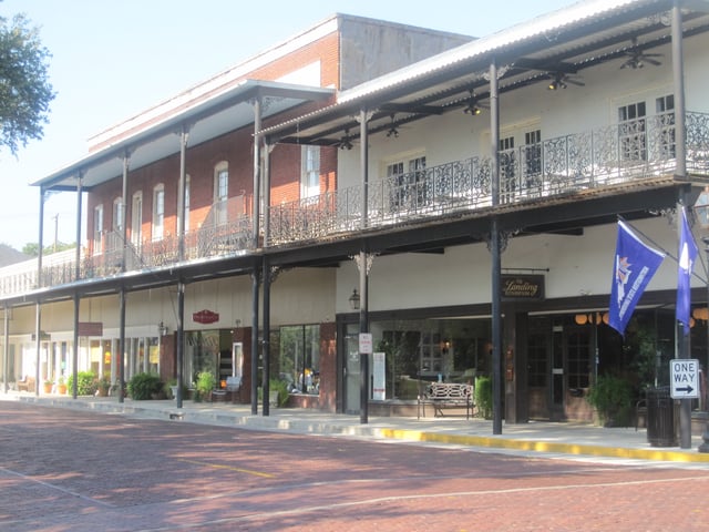 Downtown Natchitoches with historic buildings, stores, and shops, maintains brick streets