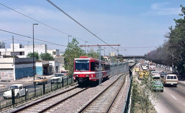 Line 1 of the Guadalajara light rail/metro system, in the middle of Avenida Colón. The two-line system is partly at ground level and partly underground.