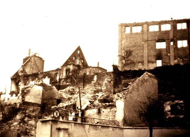 Town center after Allied bombing of civilian homes on 7 October 1943