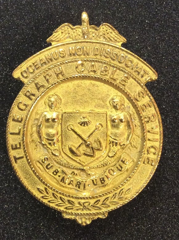 Eastern Telegraph Company lapel badge 1914-1918.  Displayed at Porthcurno Telegraph Museum.