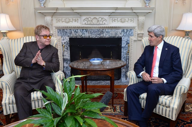 Elton John and United States Secretary of State John Kerry discuss AIDS relief and the work of the Elton John AIDS Foundation at the United States Department of State in Washington, D.C., 24 October 2014