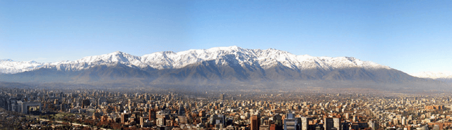 Panoramic view of northeastern Santiago, as seen from the hills of Parque Metropolitano in Providencia. Visible in the background are Apoquindo and Sierra de Ramón.