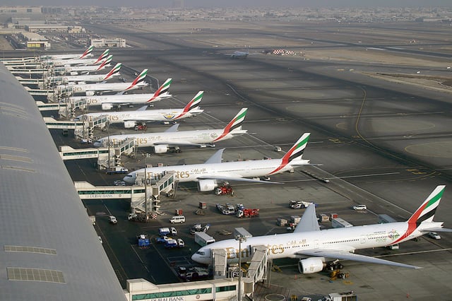 A row of Boeing 777-300s and -300ERs at Dubai International Airport operated by Emirates, the largest 777 customer.