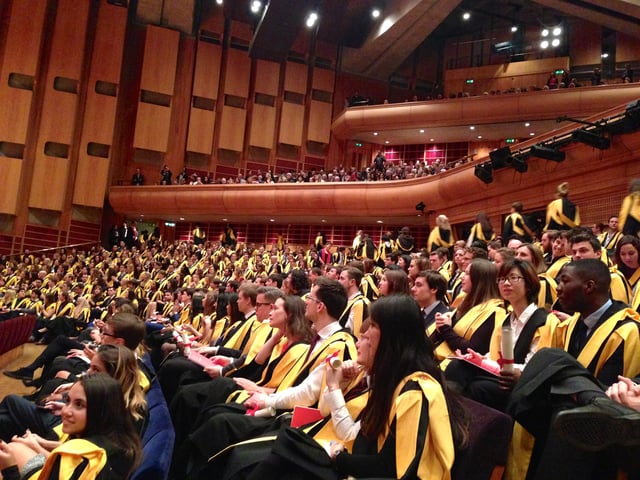 King's graduands with academic dress designed by Vivienne Westwood